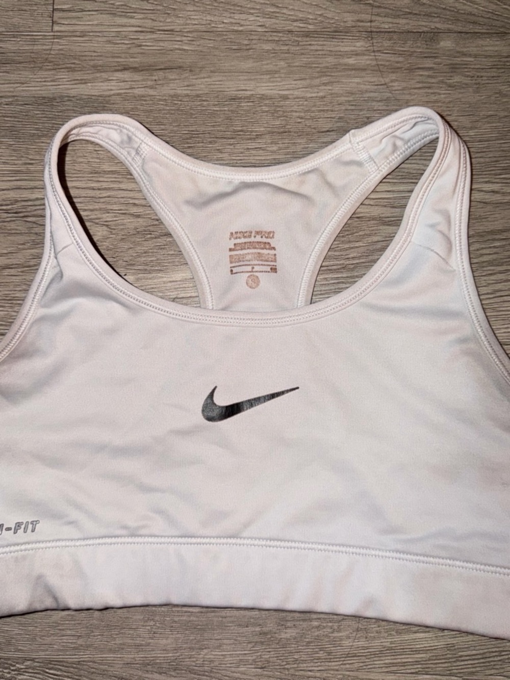Nike Pale Pink Racerback Sports Bra with Black Swoosh